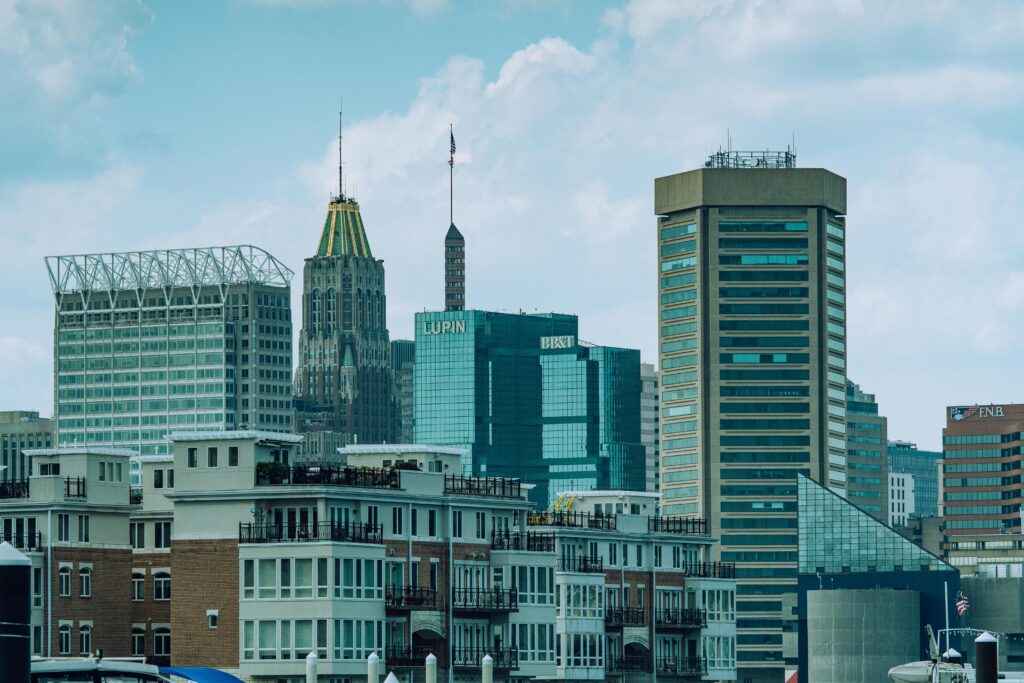 A vibrant view of Baltimore cityscape featuring iconic skyscrapers under a clear sky.